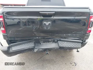 2020 Ram 1500 Limited with VIN 1C6SRFHT3LN407647, listed as a IAAI auction lot 41523210 with 69,331 mi miles. Bid and sale history available at carsss.com. Image 6.