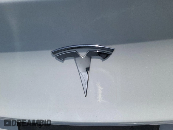 2020 Tesla Model 3 Long Range with VIN 5YJ3E1EB6LF800953, listed as a IAAI auction lot 42184419 with 34,904 mi miles and . Bid and sale history available at DreamBid. Image 1.