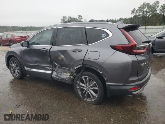 2021 Honda CR-V Touring with VIN 2HKRW1H96MH420465, listed as a Copart auction lot 86885384 with 61,699 mi miles and Salvage Title. Bid and sale history available at carsss.com. Image 2.
