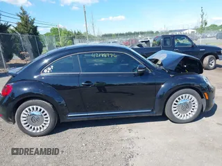 2016 Volkswagen Beetle SE с VIN 3VWJ17AT9GM620367, выставлен на аукционе IAAI как лот 42198976 с пробегом 94 048 миль миль и . История ставок и продаж доступна на DreamBid. Изображение 13.