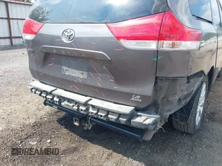 2012 Toyota Sienna LE with VIN 5TDJK3DC3CS037713, listed as a IAAI auction lot 42703815 with 208,000 mi miles and . Bid and sale history available at DreamBid. Image 6.