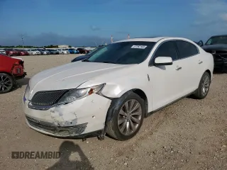 2015 Lincoln MKS z VIN 1LNHL9DK3FG605460, wystawiony jako Copart lot #57262165 z przebiegiem 99 250 mil mil oraz Szkoda całkowita • Salvage title. Historia ofert i sprzedaży dostępna na DreamBid. Obrazek 1.
