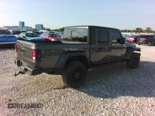 2021 Jeep Gladiator 80th Anniversary with VIN 1C6HJTAG7ML619025, listed as a Copart auction lot 63309365 with 69,126 mi miles and Salvage title. Bid and sale history available at DreamBid. Image 3.