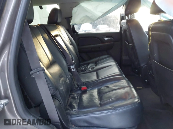 2013 Chevrolet Tahoe LT with VIN 1GNSKBE0XDR296094, listed as a IAAI auction lot 41448160 with 167,165 mi miles and . Bid and sale history available at DreamBid. Image 8.