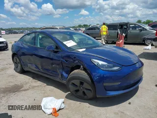 2021 Tesla Model 3 Standard Range Plus z VIN 5YJ3E1EAXMF098855, wystawiony jako IAAI lot #42226127 z przebiegiem 34 351 mil mil oraz . Historia ofert i sprzedaży dostępna na DreamBid. Obrazek 1.