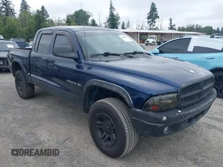 2001 Dodge Dakota Sport with VIN 1B7HG2AN41S234362, listed as a IAAI auction lot 42609255 with 152,723 mi miles and . Bid and sale history available at DreamBid. Image 1.