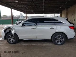 2017 Acura MDX with VIN 5FRYD4H39HB016948, listed as a IAAI auction lot 41886584 with 100,853 mi miles. Bid and sale history available at carsss.com. Image 14.