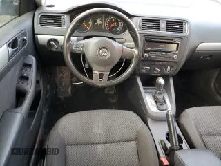 2013 Volkswagen Jetta Comfortline с VIN 3VWDL7AJ4DM408378, выставлен на аукционе Copart как лот 77094074 с пробегом 169 129 миль миль и Списание • Salvage title. История ставок и продаж доступна на DreamBid. Изображение 8.