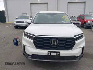 2023 Honda Pilot EX-L with VIN 5FNYG1H58PB016138, listed as a IAAI auction lot 40591717 with 10,068 mi miles and . Bid and sale history available at DreamBid. Image 12.