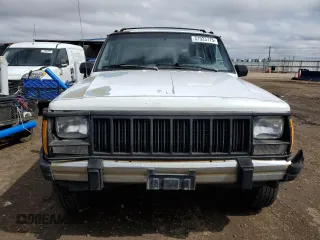 1995 Jeep Cherokee Sport z VIN 1J4FJ68S8SL650142, wystawiony jako Copart lot #51923775 z przebiegiem 329 796 mil mil oraz Czysty tytuł • Clean title. Historia ofert i sprzedaży dostępna na DreamBid. Obrazek 5.