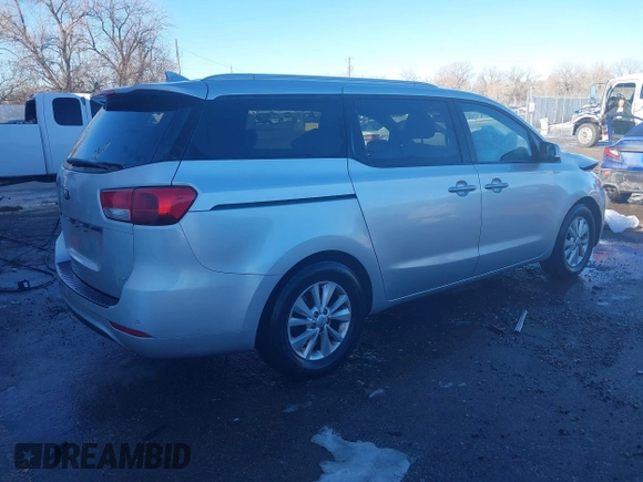 2016 Kia Sedona LX with VIN KNDMB5C18G6164472, listed as a IAAI auction lot 41661530 with 116,904 mi miles. Bid and sale history available at carsss.com. Image 4.