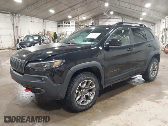 2022 Jeep Cherokee Trailhawk with VIN 1C4PJMBX8ND517236, listed as a IAAI auction lot 41530369 with 34,164 mi miles and . Bid and sale history available at DreamBid. Image 17.