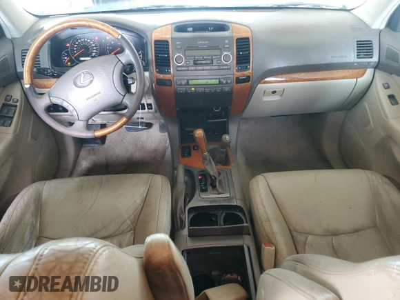 2006 Lexus GX 470 z VIN JTJBT20X060110741, wystawiony jako Copart lot #56944755 z przebiegiem 234 412 mil mil oraz Tytuł czysty. Historia ofert i sprzedaży dostępna na DreamBid. Obrazek 8.