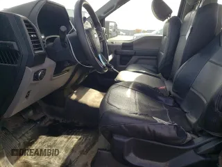2018 Ford F-150 XL with VIN 1FTMF1EP0JKC60951, listed as a Copart auction lot 77759594 with 152,604 mi miles and Salvage title. Bid and sale history available at DreamBid. Image 7.