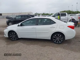 2019 Toyota Corolla L with VIN 5YFBURHE0KP875377, listed as a IAAI auction lot 41904405 with 73,604 mi miles and . Bid and sale history available at DreamBid. Image 14.