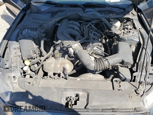 2015 Ford Mustang V6 z VIN 1FATP8EM3F5409386, wystawiony jako Copart lot #56247185 z przebiegiem 197 940 mil mil oraz Szkoda całkowita • Salvage title. Historia ofert i sprzedaży dostępna na DreamBid. Obrazek 11.