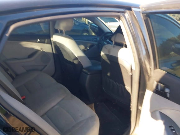 2013 Kia Optima LX with VIN 5XXGM4A71DG185525, listed as a IAAI auction lot 40803086 with 171,741 mi miles. Bid and sale history available at carsss.com. Image 8.