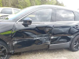 2022 Mazda CX-9 Touring Plus z VIN JM3TCBAYXN0613830, wystawiony jako IAAI lot #41942849 z przebiegiem 50 193 mil mil oraz . Historia ofert i sprzedaży dostępna na DreamBid. Obrazek 15.
