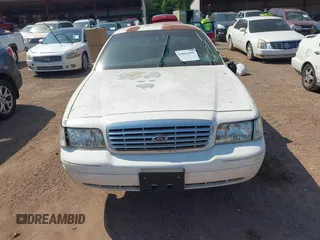 2001 Ford Crown Victoria Police Interceptor z VIN 2FAFP71W21X165218, wystawiony jako IAAI lot #42062199 z przebiegiem 233 978 mil mil oraz . Historia ofert i sprzedaży dostępna na DreamBid. Obrazek 12.
