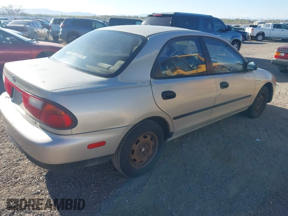 1997 Mazda Protege DX with VIN JM1BC1412V0155780, listed as a IAAI auction lot 42134286 with Not Provided miles and . Bid and sale history available at DreamBid. Image 4.