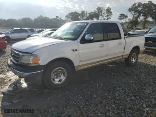 2001 Ford F-150 SuperCrew XLT with VIN 1FTRW07W51KD64839, listed as a Copart auction lot 72987494 with 300,447 mi miles and Salvage Title. Bid and sale history available at carsss.com. Image 1.