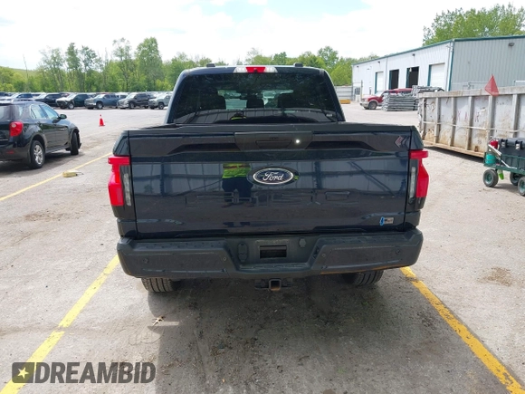 2023 Ford F-150 Lightning Pro with VIN 1FTVW1EL6PWG30061, listed as a IAAI auction lot 42362295 with 22,481 mi miles and . Bid and sale history available at DreamBid. Image 16.