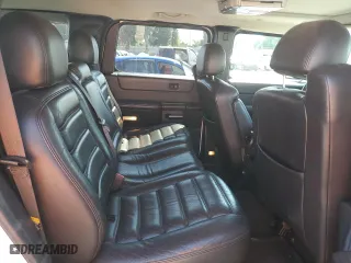 2005 Hummer H2 SUV with VIN 5GRGN23U35H132428, listed as a Copart auction lot 74594554 with 107,701 mi miles and Salvage Title. Bid and sale history available at carsss.com. Image 11.