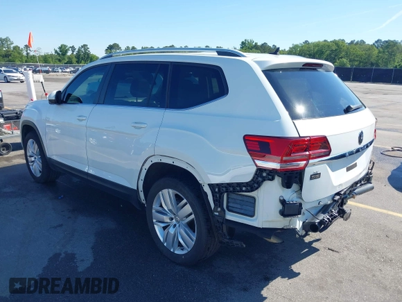 2019 Volkswagen Atlas SE z VIN 1V2WR2CA3KC503490, wystawiony jako IAAI lot #42168340 z przebiegiem 70 868 mil mil oraz . Historia ofert i sprzedaży dostępna na DreamBid. Obrazek 3.