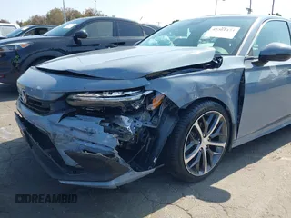 2023 Honda Civic Touring with VIN 2HGFE1F92PH322377, listed as a IAAI auction lot 42361473 with 43,533 mi miles and . Bid and sale history available at DreamBid. Image 6.