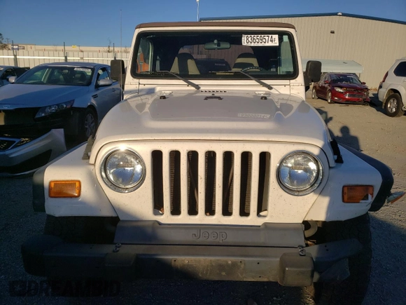 2002 Jeep Wrangler SE with VIN 1J4FA29P82P756330, listed as a Copart auction lot 83659574 with 156,901 mi miles and Salvage Title. Bid and sale history available at DreamBid. Image 5.