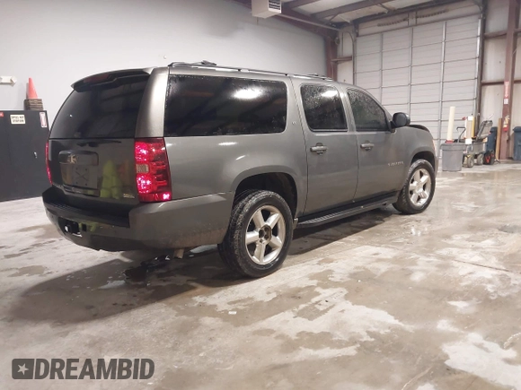 2011 Chevrolet Suburban LT with VIN 1GNSCJE0XBR180270, listed as a IAAI auction lot 41531193 with 202,493 mi miles. Bid and sale history available at carsss.com. Image 4.