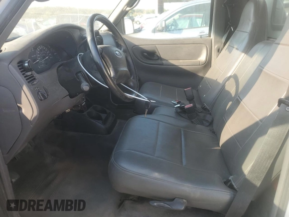 2003 Ford Ranger XL Fleet with VIN 1FTZR11E03TA35573, listed as a Copart auction lot 74200004 with 167,952 mi miles and Salvage Title. Bid and sale history available at carsss.com. Image 7.