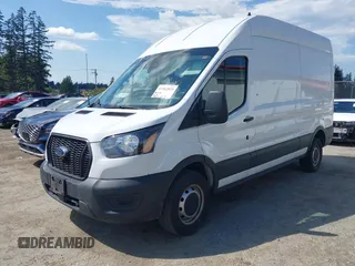 2023 Ford Transit Cargo with VIN 1FTBR1X84PKB02027, listed as a IAAI auction lot 42062820 with 79,813 mi miles and . Bid and sale history available at DreamBid. Image 17.
