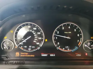 2012 BMW 7 Series 750Li с VIN WBAKB8C5XCC852493, выставлен на аукционе Copart как лот 58743535 с пробегом 168 897 миль миль и Чистый • Clean title. История ставок и продаж доступна на DreamBid. Изображение 9.