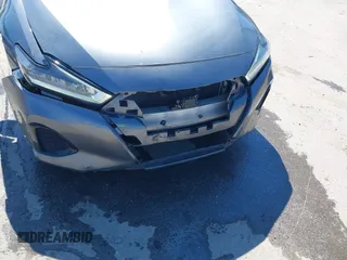 2021 Nissan Maxima SV z VIN 1N4AA6CV4MC508977, wystawiony jako IAAI lot #41858232 z przebiegiem 66 113 mil mil oraz . Historia ofert i sprzedaży dostępna na DreamBid. Obrazek 18.