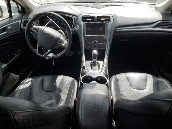 2016 Ford Fusion Titanium with VIN 3FA6P0K99GR319253, listed as a Copart auction lot 51935965 with 186,717 mi miles and Salvage Title. Bid and sale history available at DreamBid. Image 8.