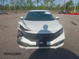 2020 Honda Civic LX with VIN 19XFC2F62LE212421, listed as a IAAI auction lot 41909995 with 46,312 mi miles and . Bid and sale history available at DreamBid. Image 12.