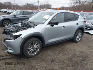 2020 Mazda CX-5 Grand Touring with VIN JM3KFBDM4L0843825, listed as a IAAI auction lot 41733575 with 18,800 mi miles. Bid and sale history available at carsss.com. Image 2.