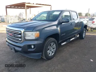 2015 GMC Canyon 2WD SLE with VIN 1GTG5BE35F1120622, listed as a IAAI auction lot 41421685 with 132,224 mi miles. Bid and sale history available at carsss.com. Image 2.