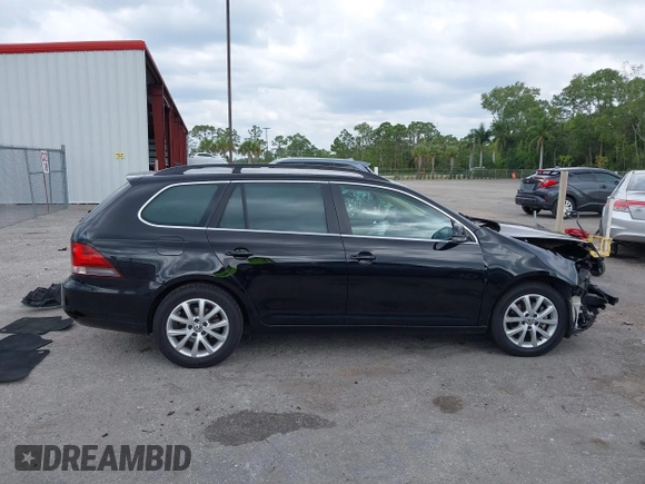 2013 Volkswagen Jetta SportWagen SE with VIN 3VWPX7AJ4DM655174, listed as a IAAI auction lot 42072632 with 65,899 mi miles. Bid and sale history available at carsss.com. Image 12.