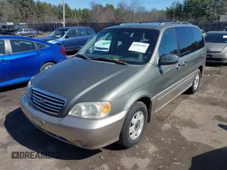 2003 Kia Sedona LX with VIN KNDUP131536414349, listed as a IAAI auction lot 41836104 with 70,130 mi miles. Bid and sale history available at carsss.com. Image 2.