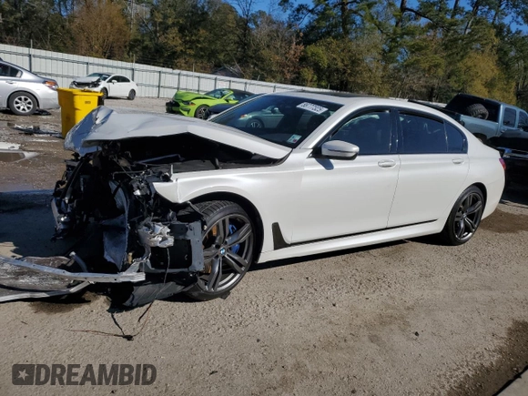 2018 BMW 7 Series 740i with VIN WBA7E2C59JG743247, listed as a Copart auction lot 88777325 with 69,071 mi miles and Salvage Title. Bid and sale history available at carsss.com. Image 1.