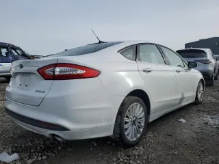 2014 Ford Fusion SE Hybrid with VIN 3FA6P0LUXER379123, listed as a Copart auction lot 45771445 with 180,393 mi miles and Salvage title. Bid and sale history available at DreamBid. Image 3.