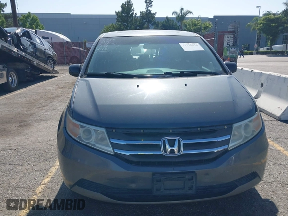 2011 Honda Odyssey EX-L with VIN 5FNRL5H64BB070836, listed as a IAAI auction lot 42520878 with 162,316 mi miles and . Bid and sale history available at DreamBid. Image 12.
