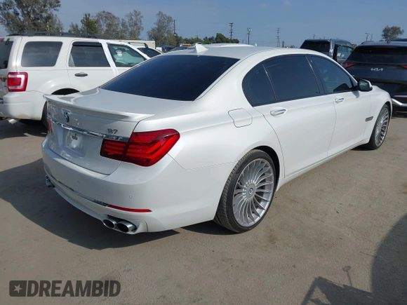 2015 BMW 7 Series 750Li with VIN WBAYE8C52FD785162, listed as a IAAI auction lot 42121389 with 88,783 mi miles and . Bid and sale history available at DreamBid. Image 4.