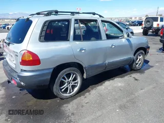 2004 Hyundai Santa Fe GLS with VIN KM8SC13E74U711329, listed as a IAAI auction lot 41814704 with 1 mi miles. Bid and sale history available at carsss.com. Image 4.