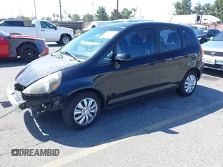 2008 Honda Fit with VIN JHMGD38438S041345, listed as a IAAI auction lot 41818722 with 128,112 mi miles. Bid and sale history available at carsss.com. Image 2.