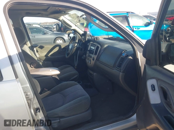 2003 Mazda Tribute LX with VIN 4F2YZ04183KM44733, listed as a IAAI auction lot 41472662 with 246,522 mi miles and . Bid and sale history available at DreamBid. Image 5.