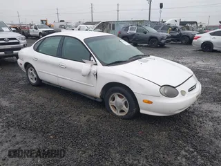 1999 Ford Taurus SE with VIN 1FAFP53U5XA269767, listed as a IAAI auction lot 41504302 with 182,198 mi miles. Bid and sale history available at carsss.com. Image 1.