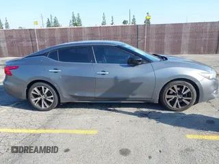 2018 Nissan Maxima SL with VIN 1N4AA6AP1JC400557, listed as a IAAI auction lot 42094626 with 96,764 mi miles and . Bid and sale history available at DreamBid. Image 13.